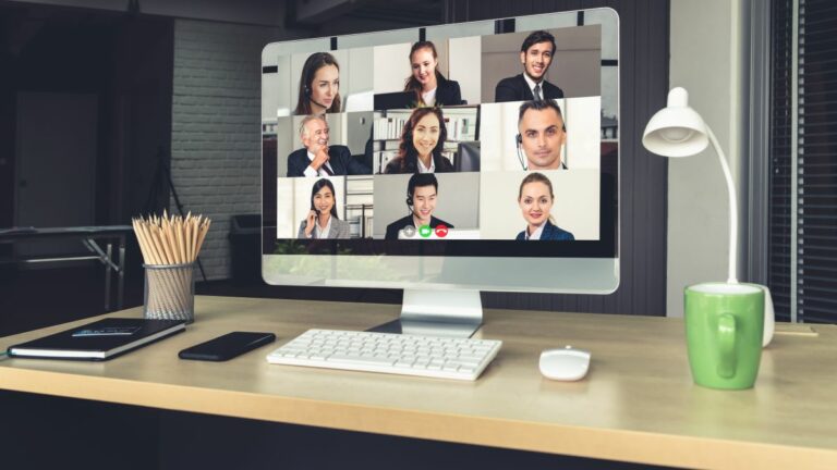 computer screen and desk during video conference call