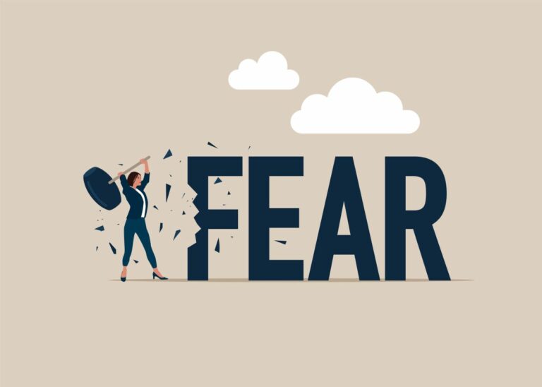 cartoon professional woman with sledge hammer destroying the word FEAR