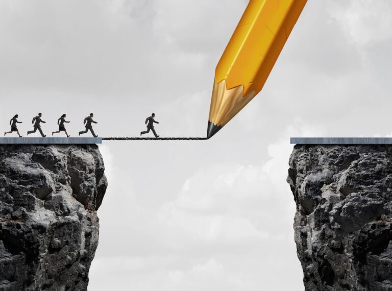 illustrative image representing bridging the career management gap in organisation with employees on one side of a mountainous cavern, with a pencil drawing a line representing a bridge between that and the other side