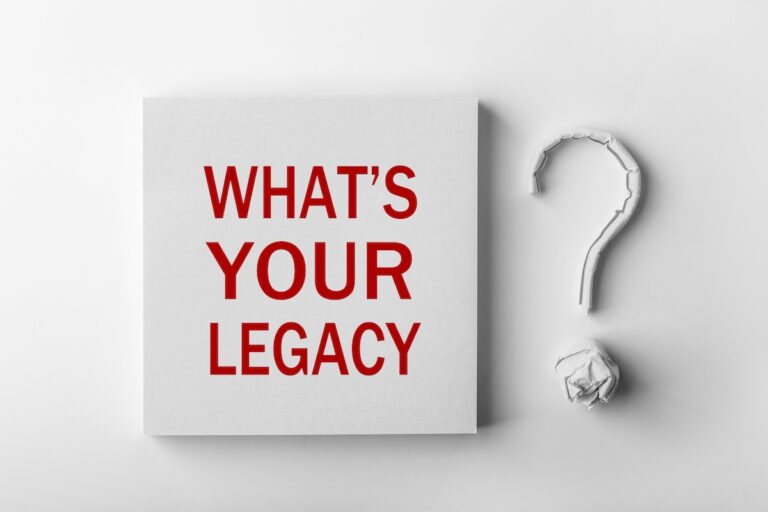 What's Your Legacy? - an inscription on a card with a question mark to the right, symbolising the need to build a strong legacy before leaving your career for the what will your leadership legacy be blog.